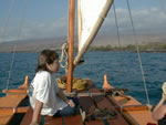 sitting on the sailboat platform